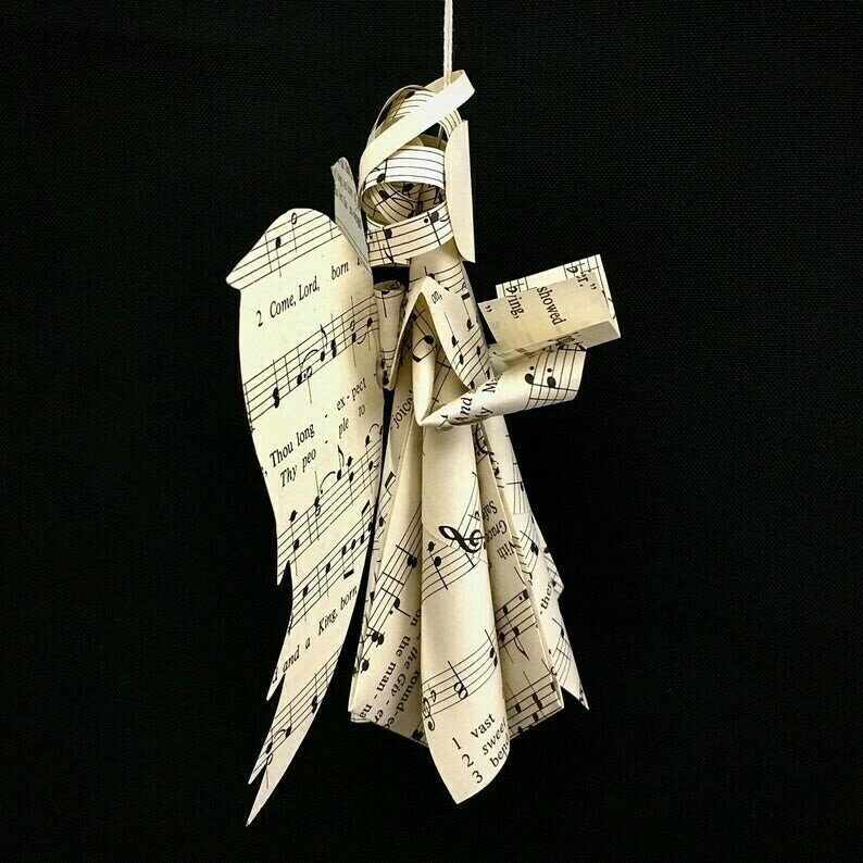 Sheet Music Angel Ornament holding a book made from Hymnal Pages