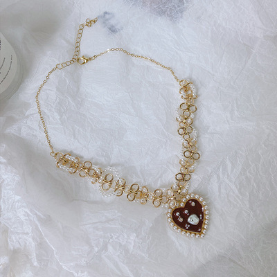 Vintage compiled pearl love necklace