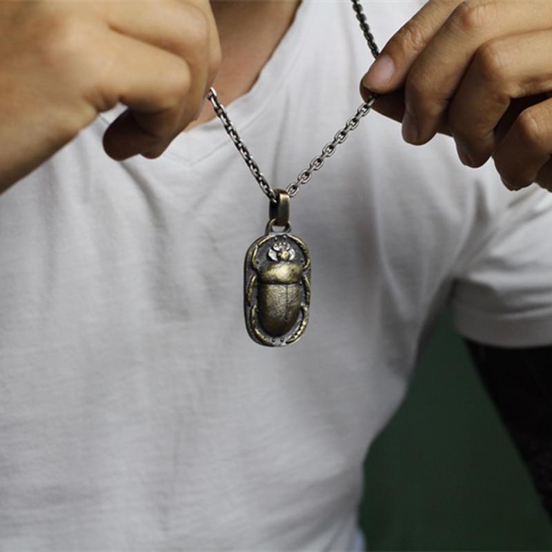 Vintage beetle brass pendant