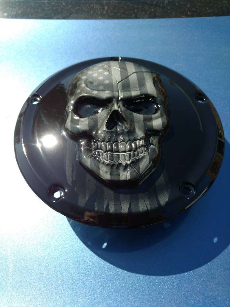 Harley Davidson 3D Skull With Ghosted Tattered American Flag On A Harley-Davidson Derby And Points Cover