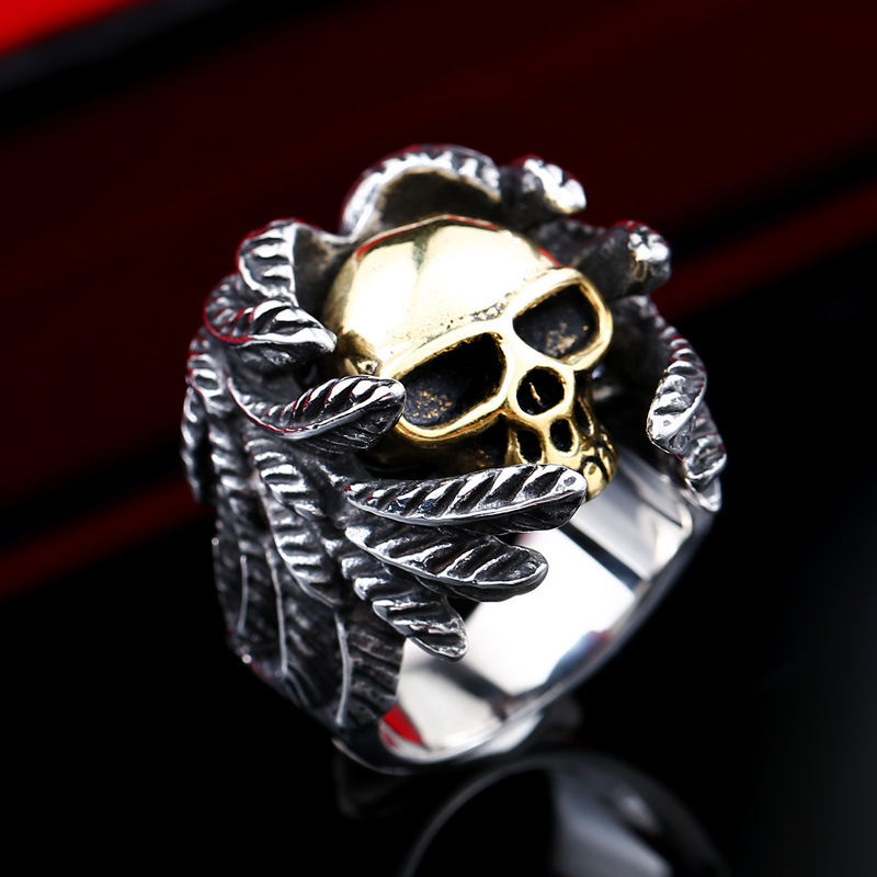 Titanium steel electric gold feather skull ring