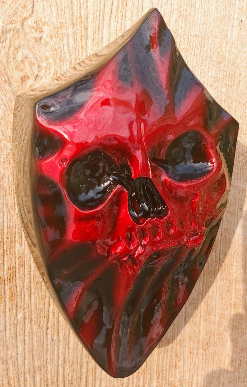 Custom Harley-Davidson horn cover with 3D teardrop twisted skull stretching through