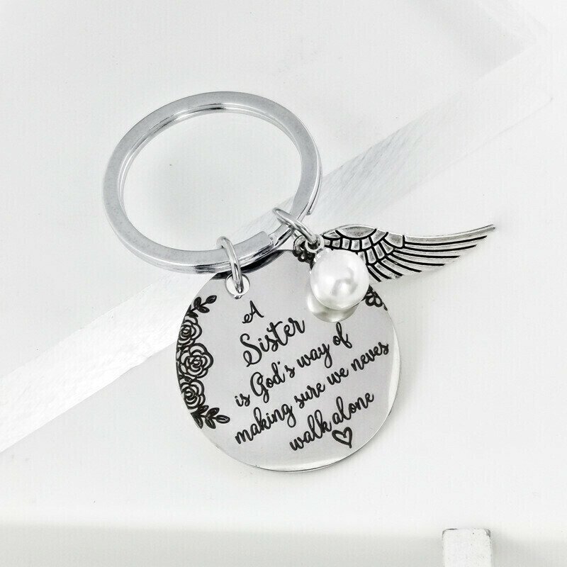 A Sister is God's Way of Making Sure We Never Walk Alone Keychain