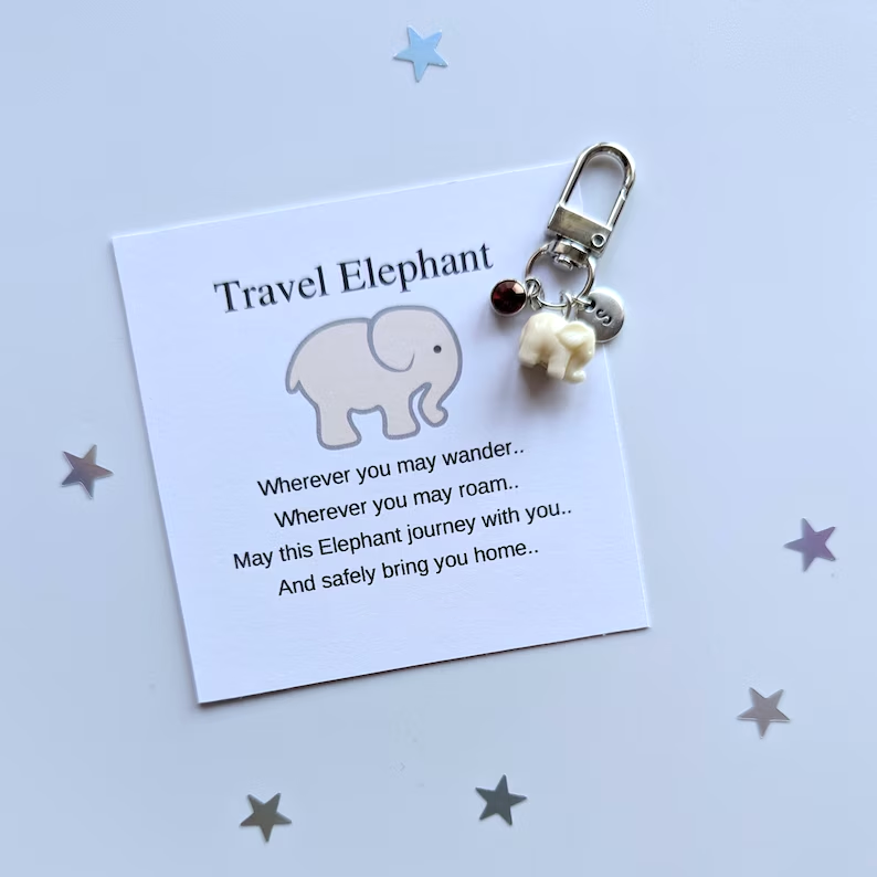 Cream Travel elephant keychain - elwant