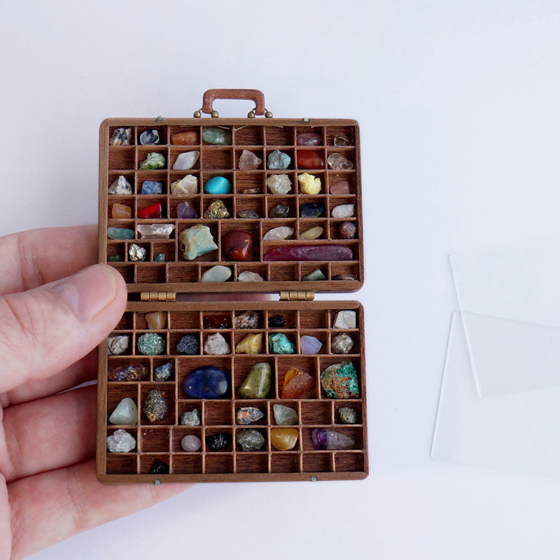 Collection of stones in a suitcase