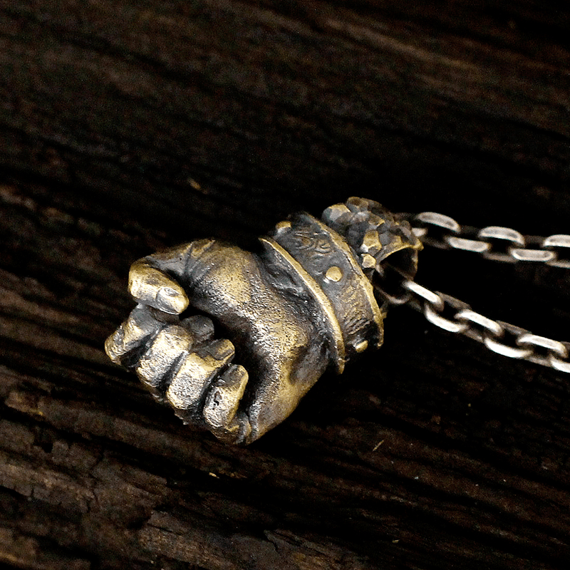 Powerful Fist of Fate Sterling Silver Brass Pendant