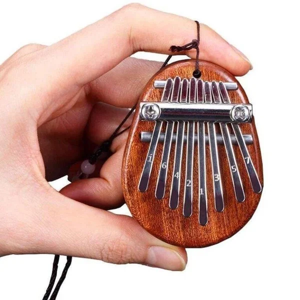 (🔥HOT SALE NOW - SAVE 50% OFF)  8 Keys Mini Kalimba Thumb Piano -BUY 3 FREE SHIPPING