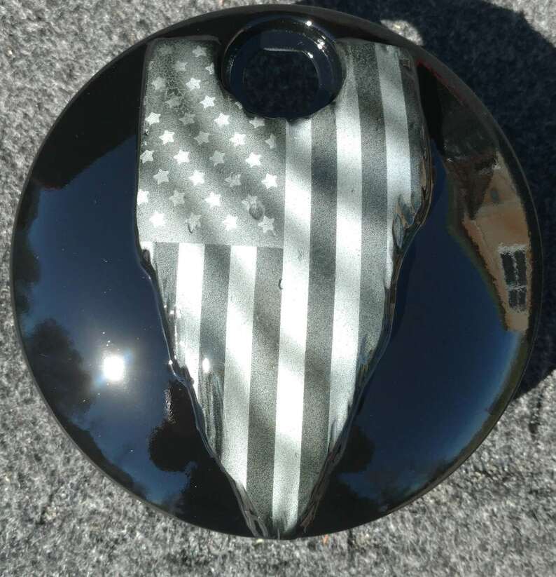 Harley Motorcycle Tattered American flag on a Harley Davidson touring fuel door