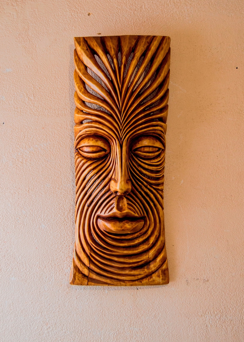 Hand carved wooden wall panel