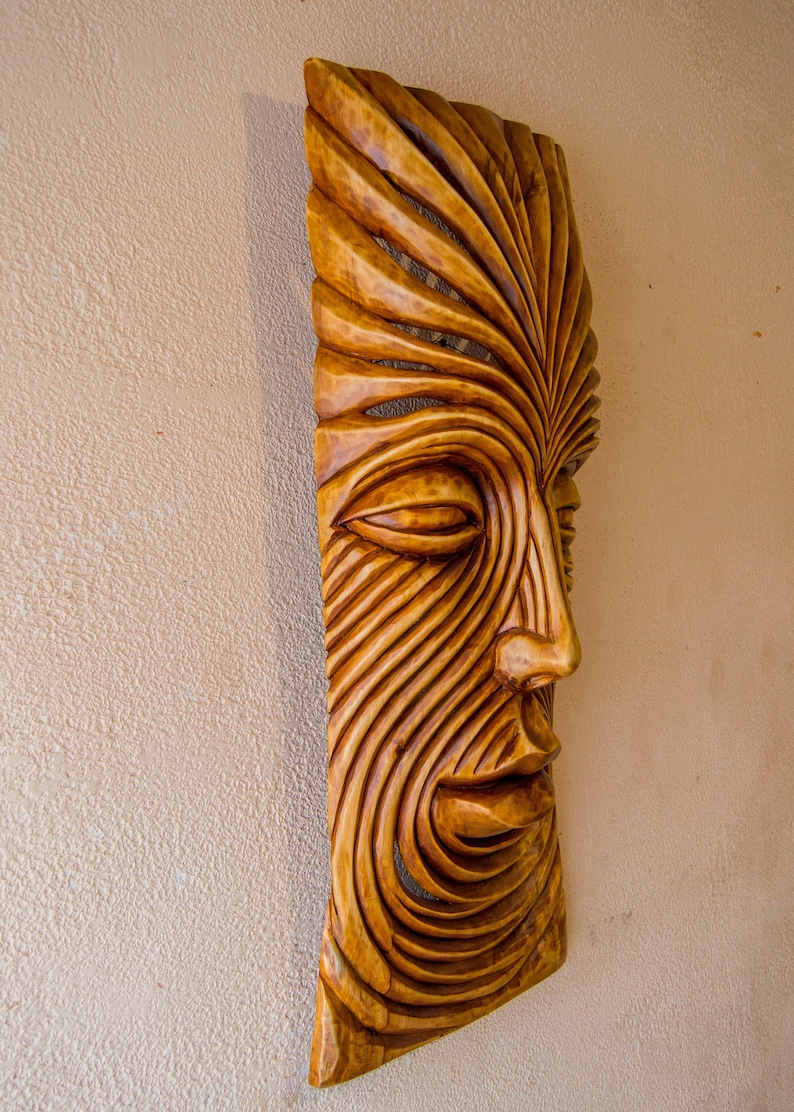 Hand carved wooden wall panel