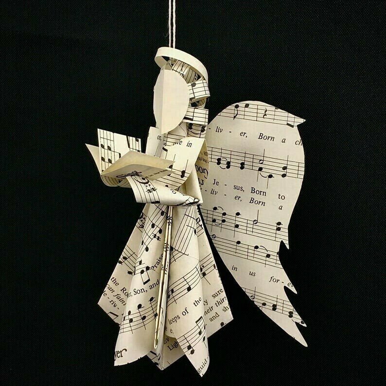 Sheet Music Angel Ornament holding a book made from Hymnal Pages