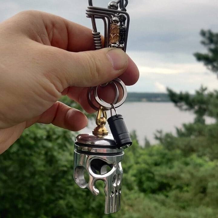 Piston art skull keychain (pendant/flashlight/bottle opener)