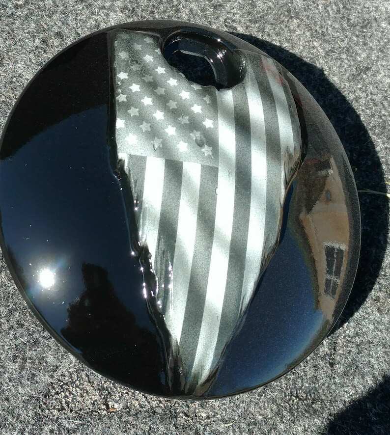 Harley Motorcycle Tattered American flag on a Harley Davidson touring fuel door