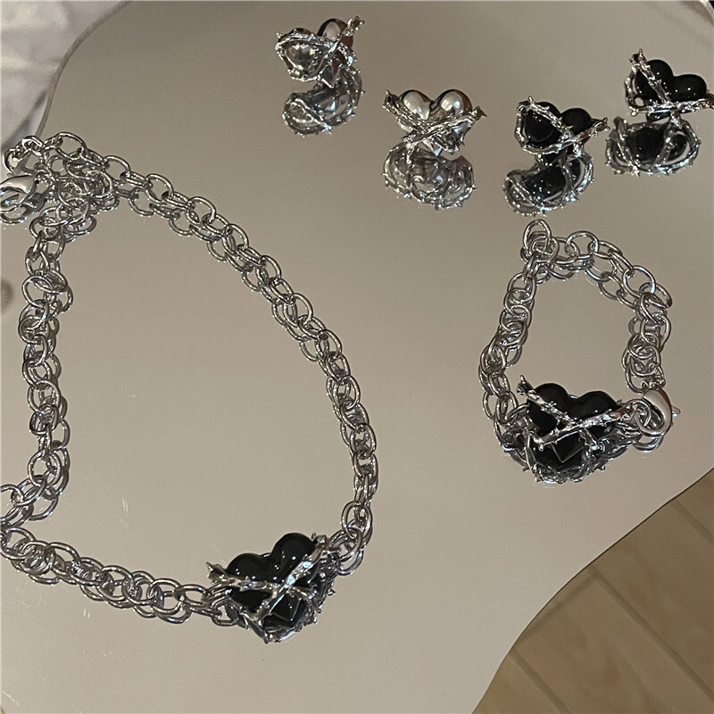Thorn love earrings / bracelet / necklace
